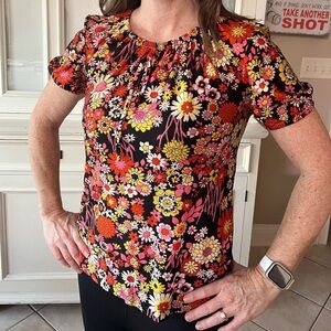 Vintage 60’s or 70’s flower power shirt!  Size M/L multi color.